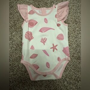 Monica and Andy seashell onesie